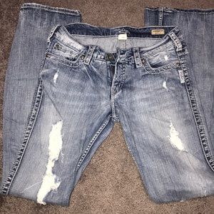 Ripped front silver jeans